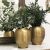 Vase en aluminium motifs gravés doré